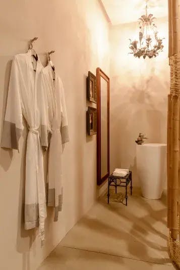 robes-on-the-bathroom-wall
